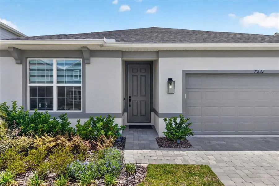 Exterior details and patio area of a home in EverBe, Orlando (Image 29). Exterior details and patio area of a home in EverBe, Orlando (Image 29).