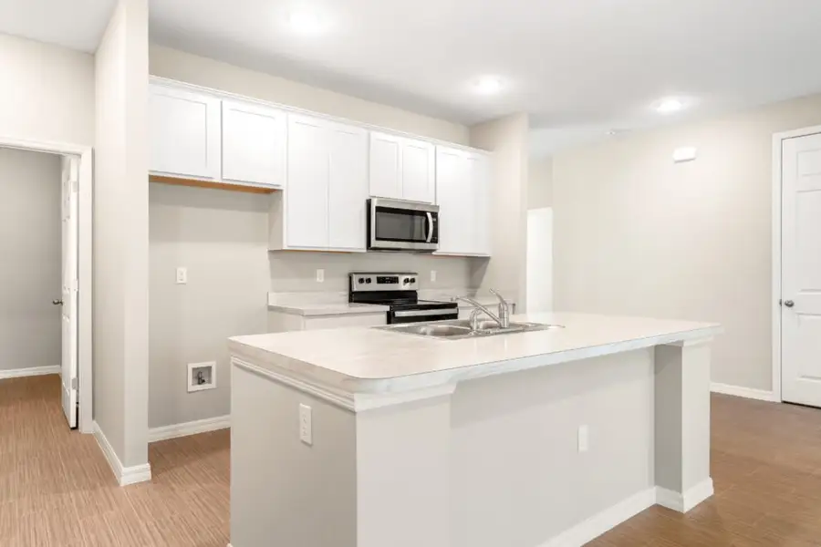 Representative furnished interior of a home built from the Delray by Holiday Builders in Palm Bay, Palm Bay (Image 4).