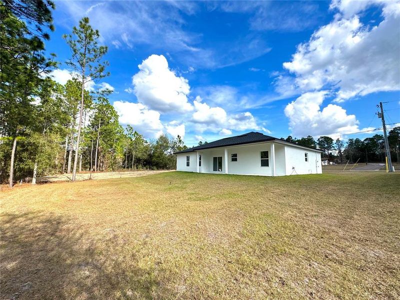 Exterior details and patio area of a home in , Citrus Springs (Image 19).