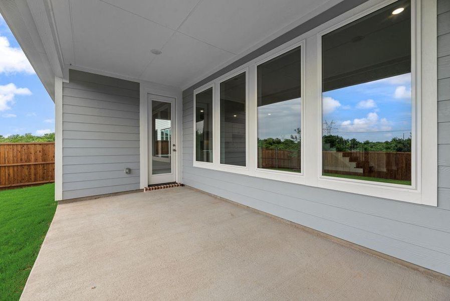 Exterior details and patio area of a home in Creekside of Crowley, Crowley (Image 4).