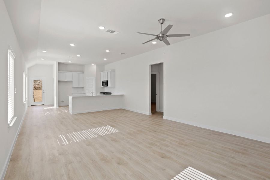 Living room in the Pecan II home plan by Trophy Signature Homes – REPRESENTATIVE PHOTO