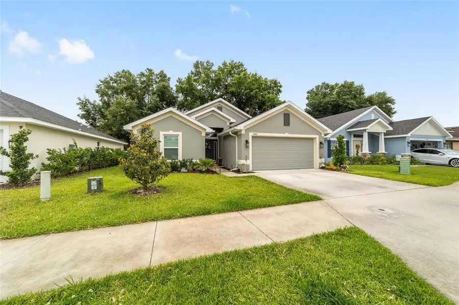 Front exterior of a new home in , Ocala, FL, highlighting curb appeal (Image 1). Front exterior of a new home in , Ocala, FL, highlighting curb appeal (Image 1).