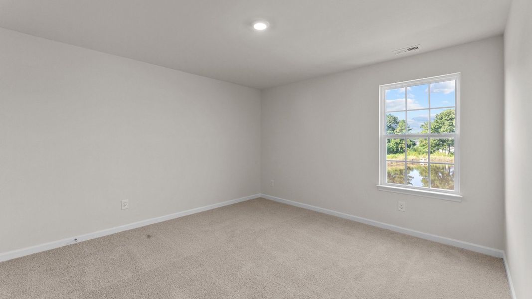 Spacious, unfurnished interior of a new home in Ridgewood Farms, Winterville (Image 19).