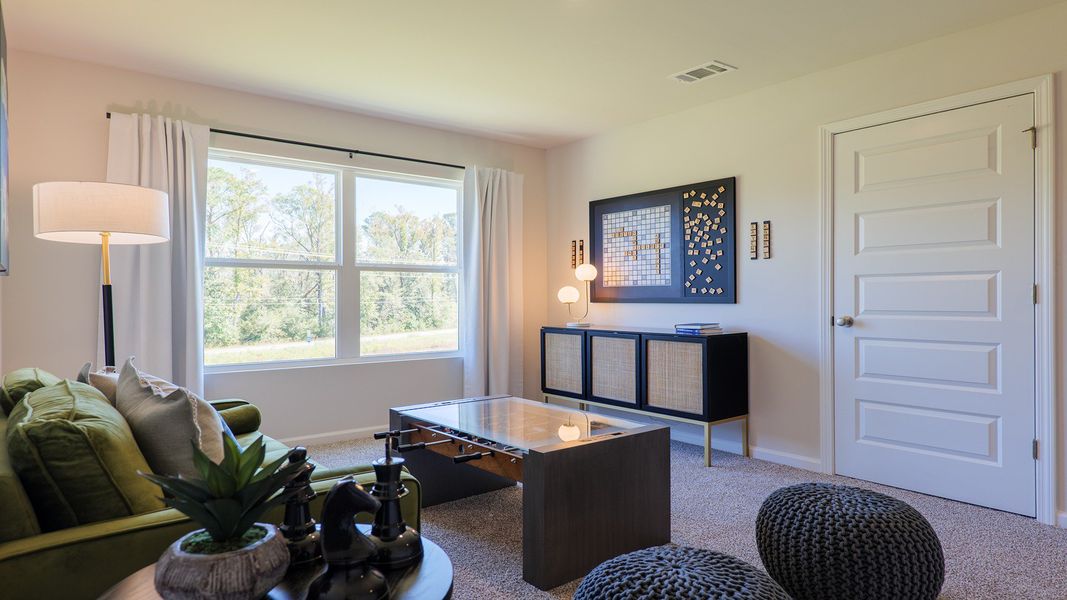 Representative furnished interior of a home built from the The Carol by D.R. Horton in Olson Ridge, Tallahassee (Image 14).
