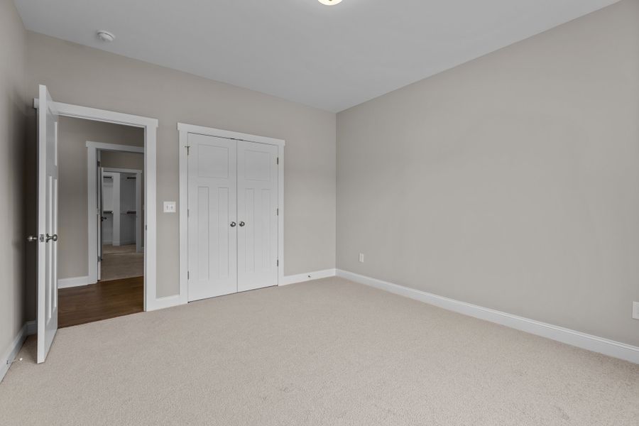 Representative unfurnished interior of a home built from the Haddock by Bill Clark Homes in Laurel Oaks, Greenville (Image 38).
