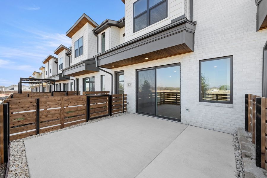 Exterior details and patio area of a home in Wildridge, Oak Point (Image 4).
