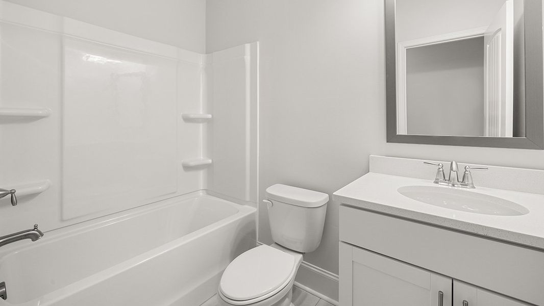 Representative furnished interior of a home built from the BELLVIEW by D.R. Horton in Haven Abbey, Cumming (Image 23).