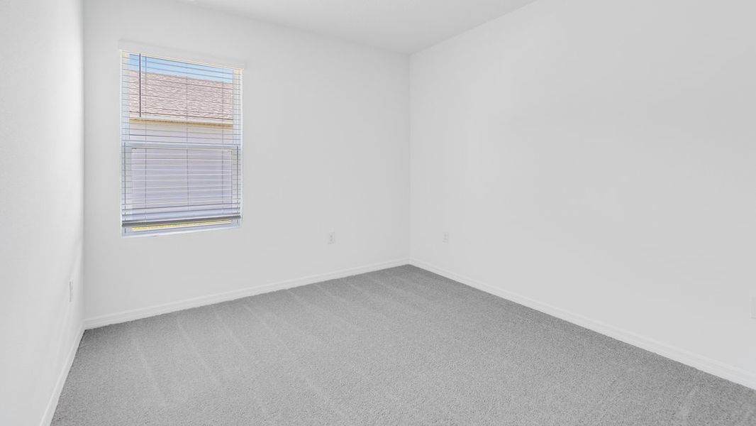 Representative unfurnished interior of a home built from the Ambrosia by Taylor Morrison in Aden South at Westview, Kissimmee (Image 19).