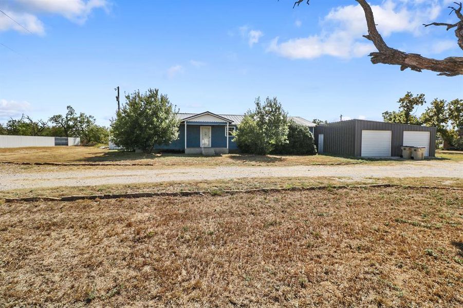 Front exterior of a new home in , Santa Anna, TX, highlighting curb appeal (Image 21).