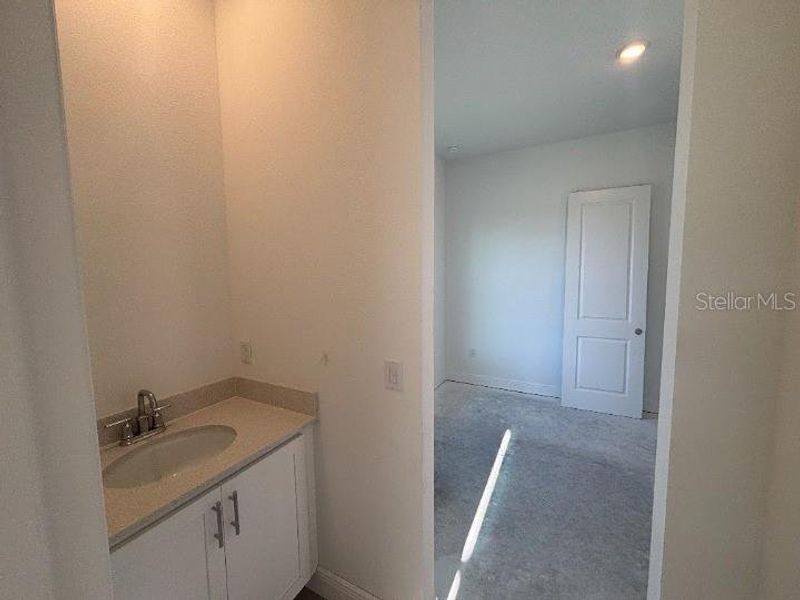 Furnished interior view inside a new home in Ardisia Park Estate, New Smyrna Beach (Image 11).