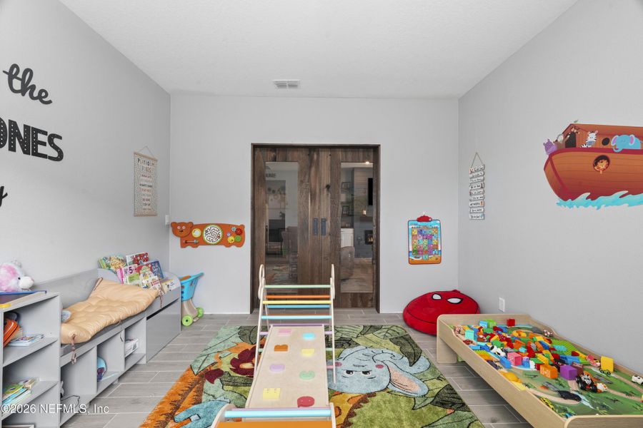 Furnished interior view inside a new home in Granary Park, Green Cove Springs (Image 32).