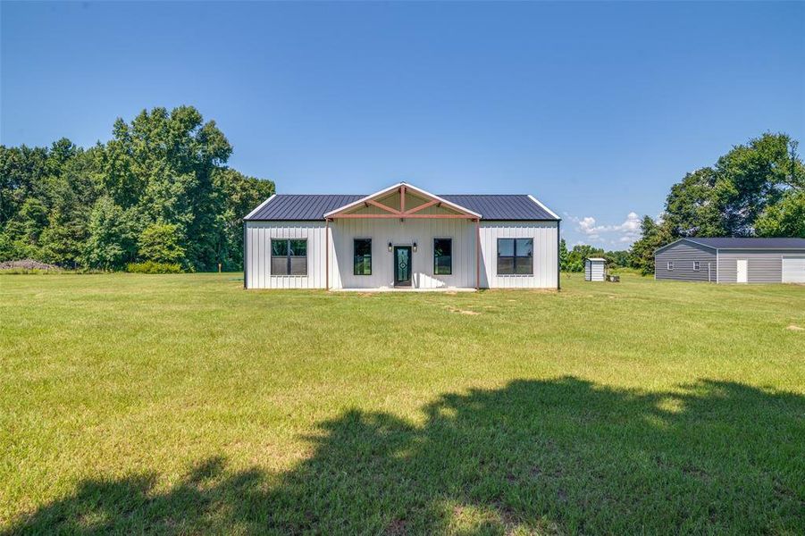 Front exterior of a new home in , Grand Saline, TX, highlighting curb appeal (Image 19). Front exterior of a new home in , Grand Saline, TX, highlighting curb appeal (Image 19).