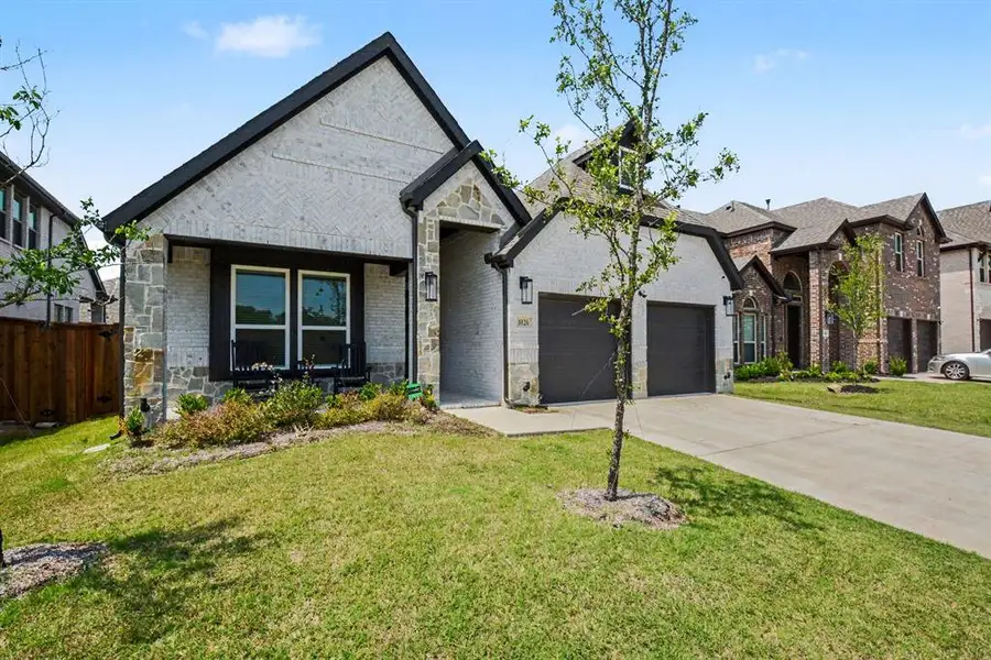 Front exterior of a new home in , Forney, TX, highlighting curb appeal (Image 21).