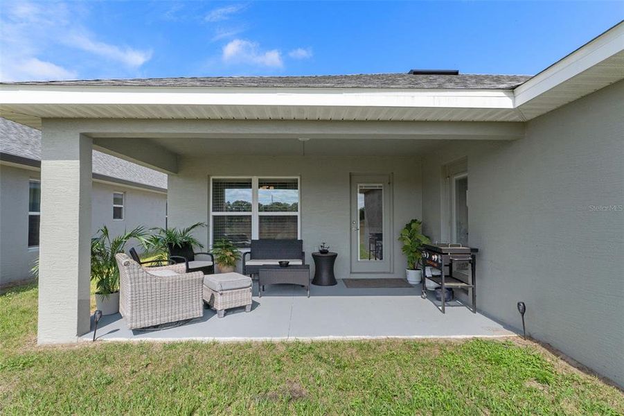 Exterior details and patio area of a home in Pine Bluff, Spring Hill (Image 24).