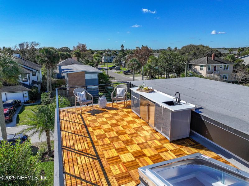 Exterior details and patio area of a home in , Neptune Beach (Image 33).