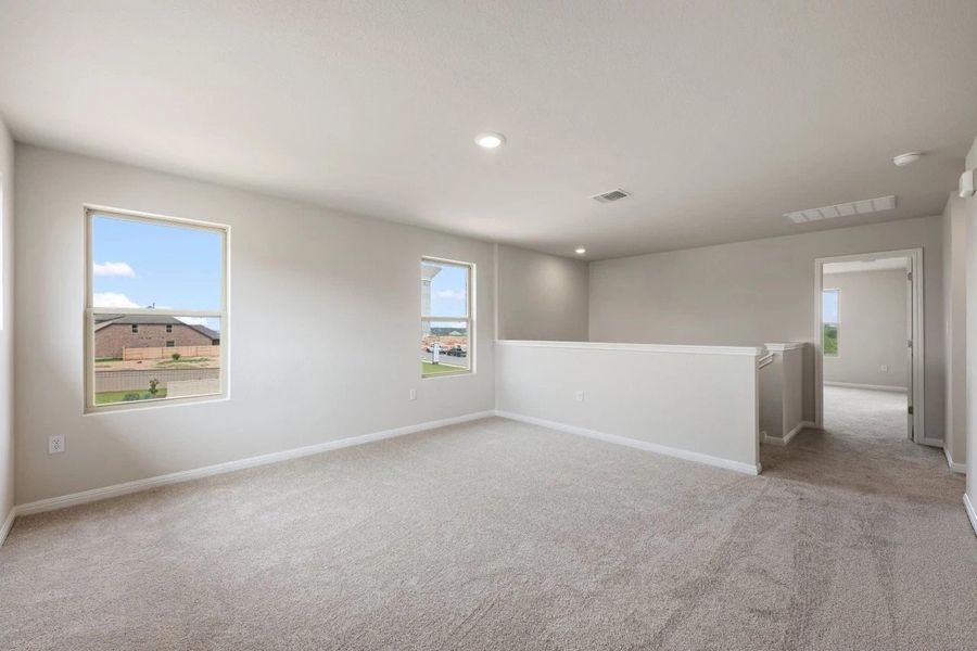 Spacious, unfurnished interior of a new home in The Colony, Bastrop (Image 22).
