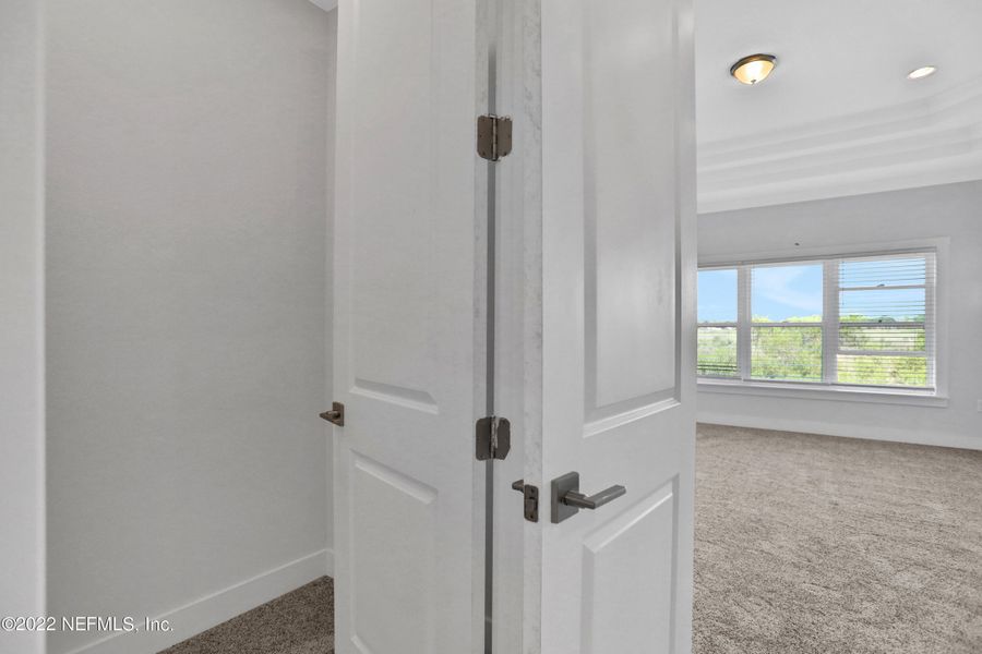 Spacious, unfurnished interior of a new home in TrailMark, St. Augustine (Image 35).