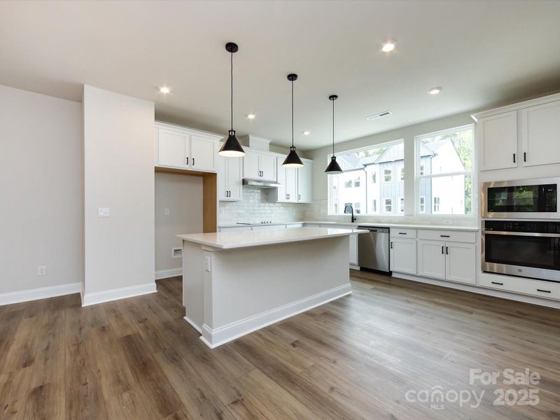 GE Stainless Appliances and Matte Black Hardware.