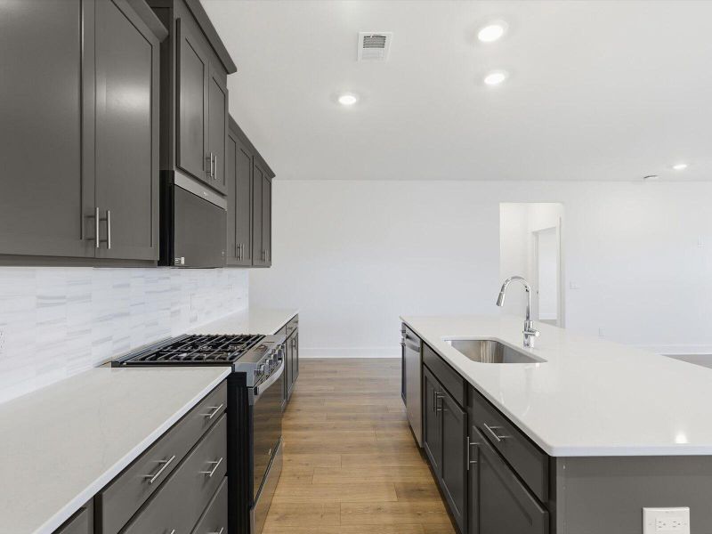 Furnished interior view inside a new home in The Coves at Lakes of Cane Bay, Summerville (Image 14).
