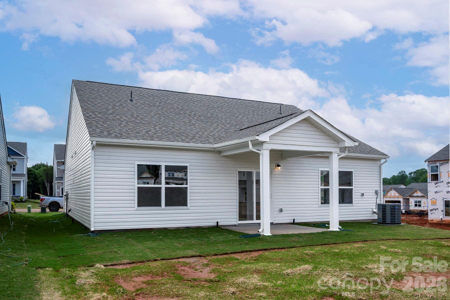 Exterior details and patio area of a home in Ascot Woods, Charlotte (Image 2). Exterior details and patio area of a home in Ascot Woods, Charlotte (Image 2).