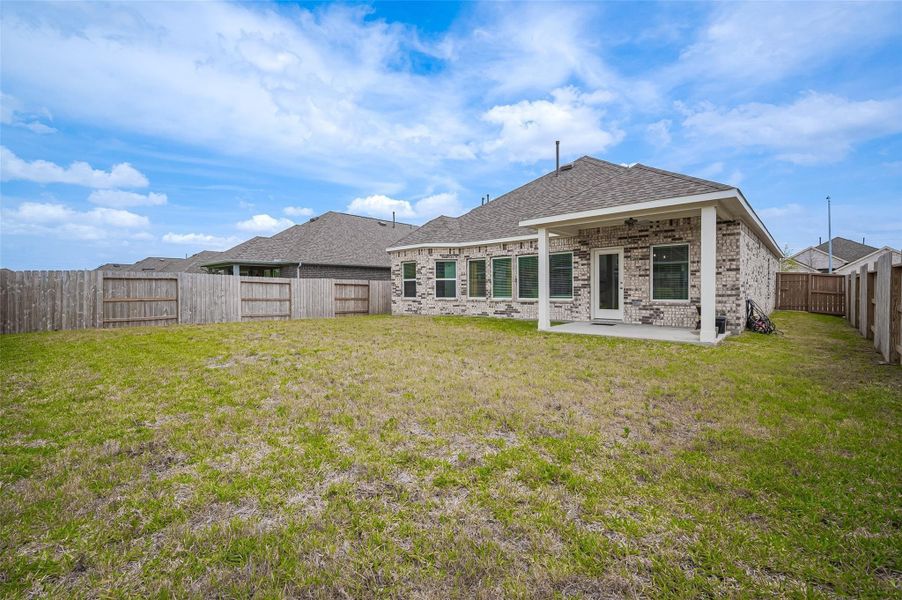 Front exterior of a new home in Marvida, Cypress, TX, highlighting curb appeal (Image 22).