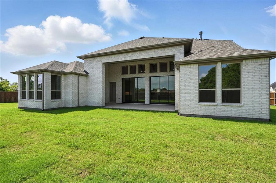 Front exterior of a new home in Saddle Star Estates, Rockwall, TX, highlighting curb appeal (Image 15). Front exterior of a new home in Saddle Star Estates, Rockwall, TX, highlighting curb appeal (Image 15).