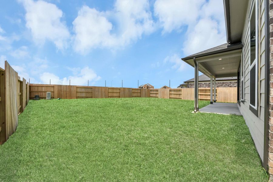 Backyard retreat, offering an abundance of space for kids to play and explore. The possibilities are endless in this outdoor haven, where the joy of open-air activities and family gatherings awaits.