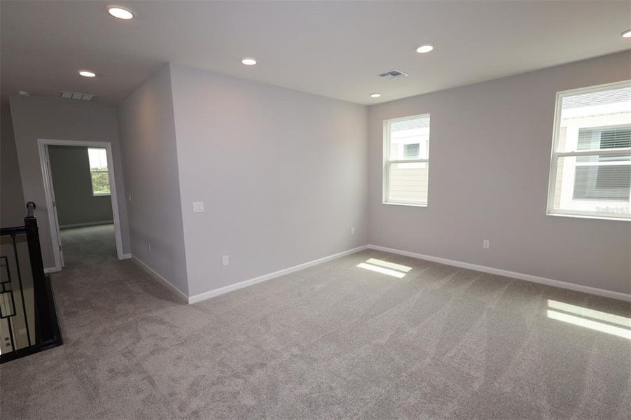 Spacious, unfurnished interior of a new home in Center Lake on the Park, St. Cloud (Image 53).