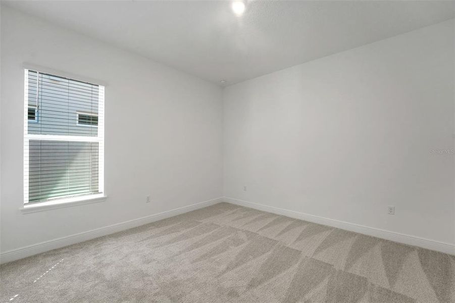 Spacious, unfurnished interior of a new home in Palms at Windermere, Windermere (Image 35).