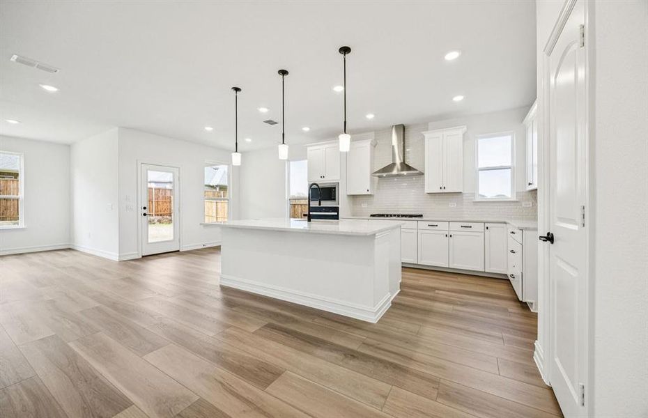 Airy kitchen with ample cabinet space Airy kitchen with ample cabinet space