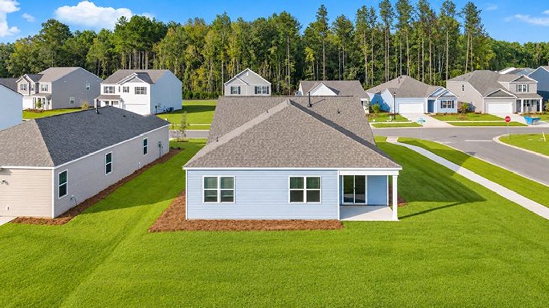 Front exterior of a new home in Pine Hills at Cane Bay, Summerville, SC, highlighting curb appeal (Image 18).