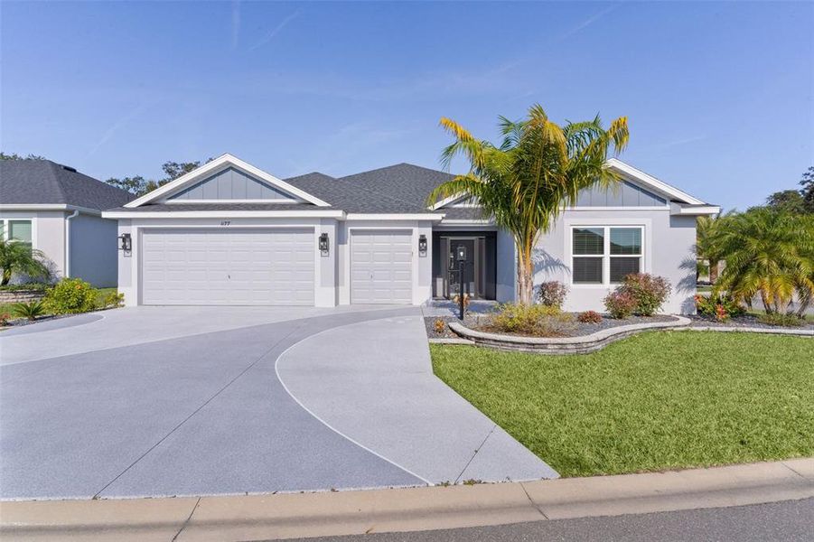 Front exterior of a new home in , The Villages, FL, highlighting curb appeal (Image 24). Front exterior of a new home in , The Villages, FL, highlighting curb appeal (Image 24).