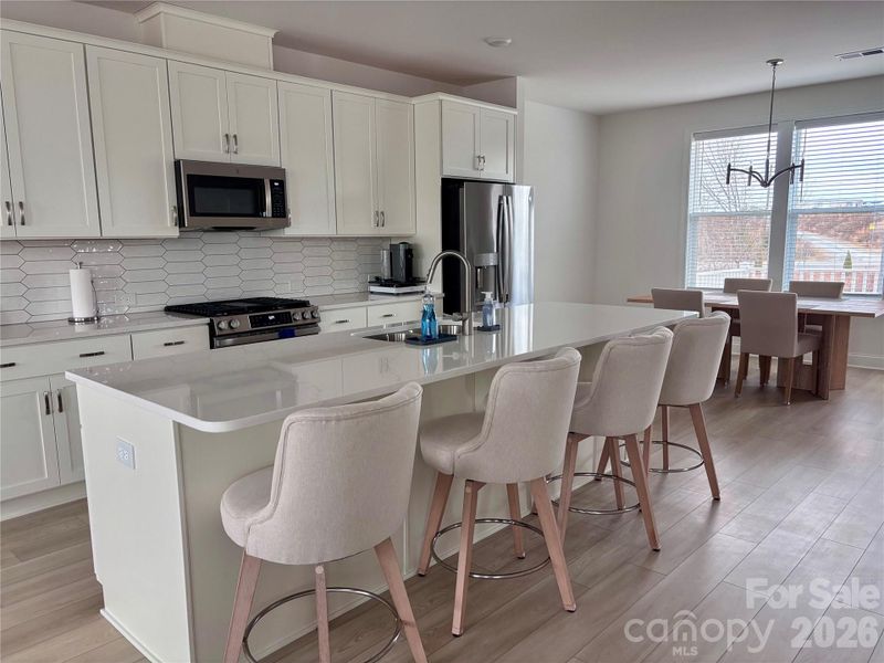 Furnished interior view inside a new home in , Concord (Image 6).