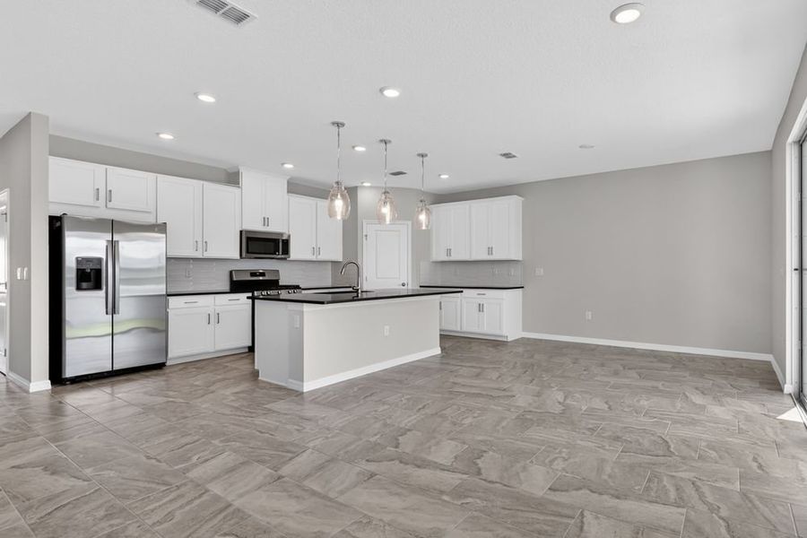 Representative furnished interior of a home built from the Bellflower by Taylor Morrison in Cherry Elm at SilverLeaf, St. Augustine (Image 6).