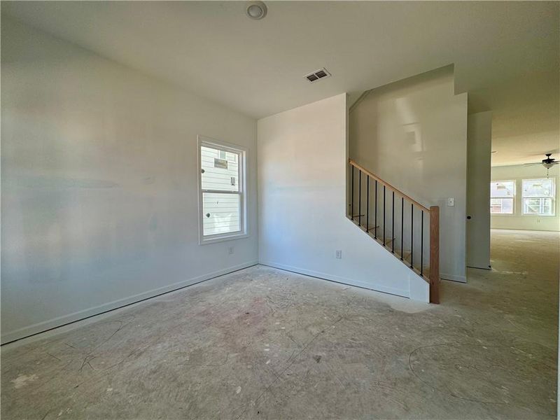 Spacious, unfurnished interior of a new home in Eastlyn Crossing - Single Family, Flowery Branch (Image 7). Spacious, unfurnished interior of a new home in Eastlyn Crossing - Single Family, Flowery Branch (Image 7).