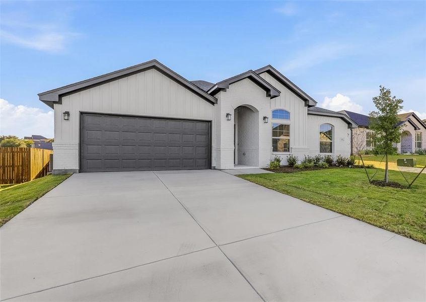 Front exterior of a new home in Stoneview, Glen Rose, TX, highlighting curb appeal (Image 22). Front exterior of a new home in Stoneview, Glen Rose, TX, highlighting curb appeal (Image 22).