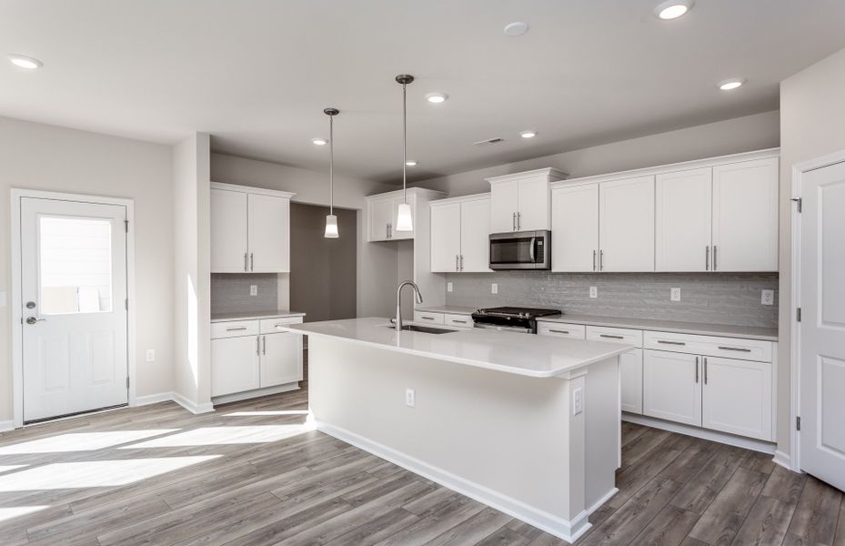 Representative furnished interior of a home built from the Richton by Pulte Homes in Riverlights, Wilmington (Image 5).