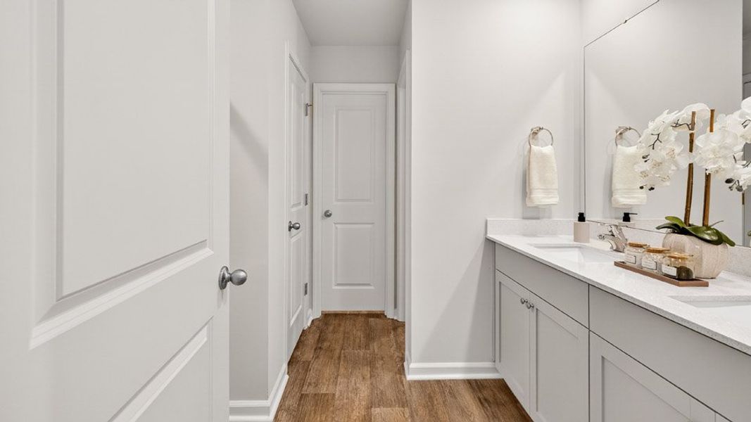 Representative furnished interior of a home built from the OLIVER by D.R. Horton in Barwell Park, Raleigh (Image 14).