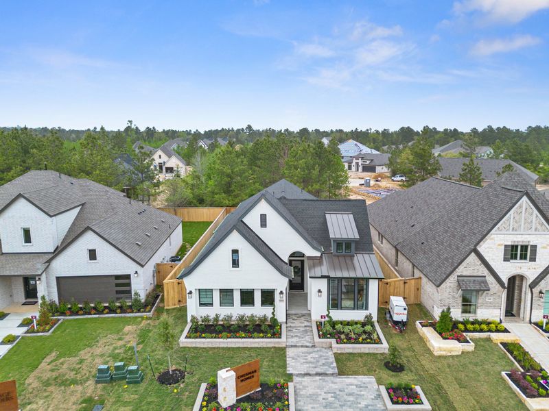 Front exterior of a new home in Kresston, Montgomery, TX, highlighting curb appeal (Image 24).