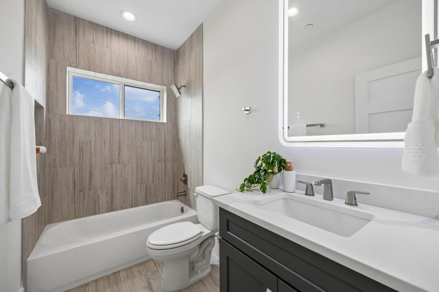 There is a full bath on the fourth floor that opens onto the family room. There is a full bath on the fourth floor that opens onto the family room.