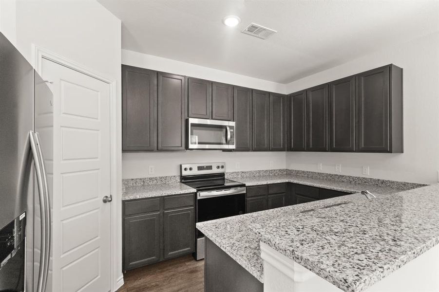 Furnished interior view inside a new home in Christian Meadows, Ennis (Image 5).