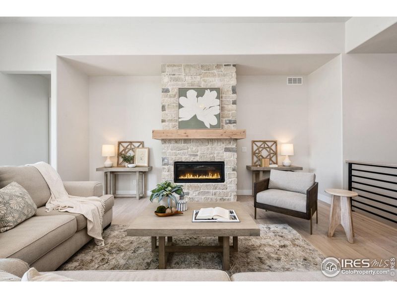 Linear Fireplace with Stone to Ceiling!
