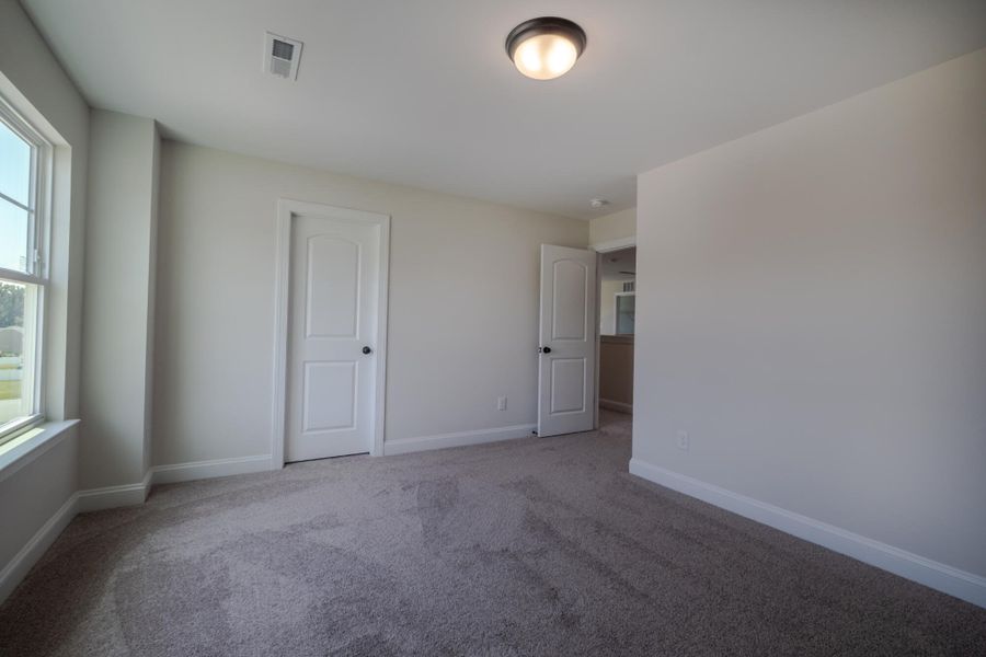 Spacious, unfurnished interior of a new home in Cottages at Piper Village, Trinity (Image 37). Spacious, unfurnished interior of a new home in Cottages at Piper Village, Trinity (Image 37).