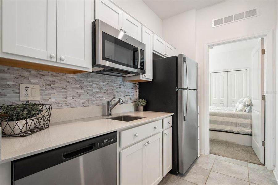 Furnished interior view inside a new home in , Winter Haven (Image 41).