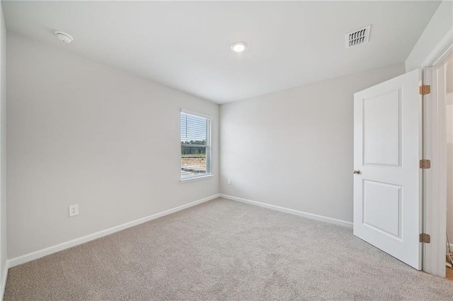 Spacious, unfurnished interior of a new home in Parkside at Grayson, Grayson (Image 18).