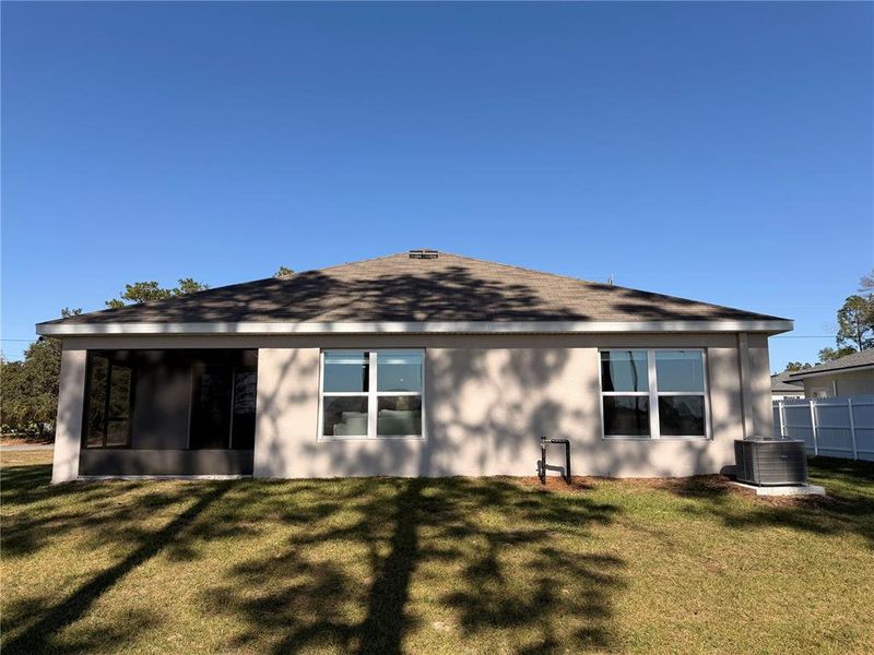 Exterior details and patio area of a home in Marion County Spot Lots, Ocala (Image 4).