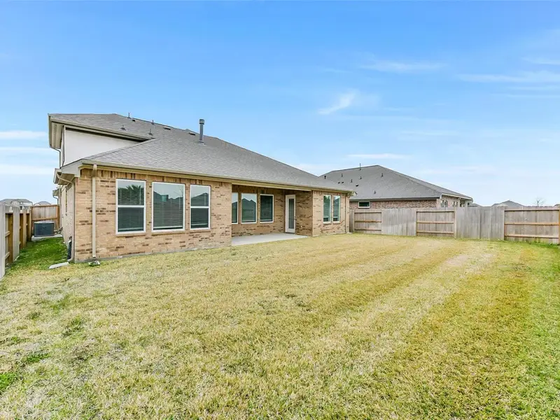 Exterior details and patio area of a home in Lago Mar, Texas City (Image 4). Exterior details and patio area of a home in Lago Mar, Texas City (Image 4).