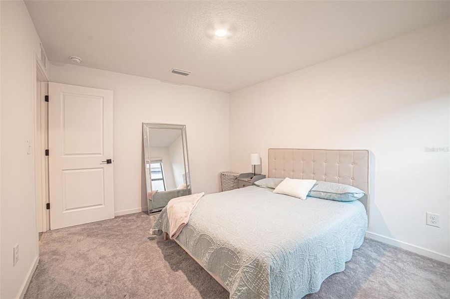 Furnished interior view inside a new home in The Crossing at Palm River, Tampa (Image 17).