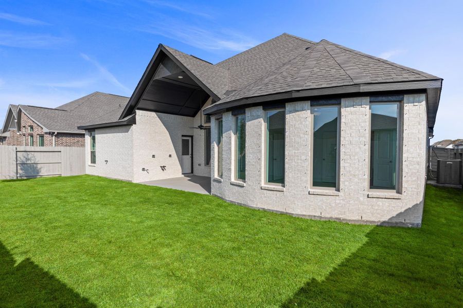 Exterior details and patio area of a home in Pomona, Manvel (Image 21).