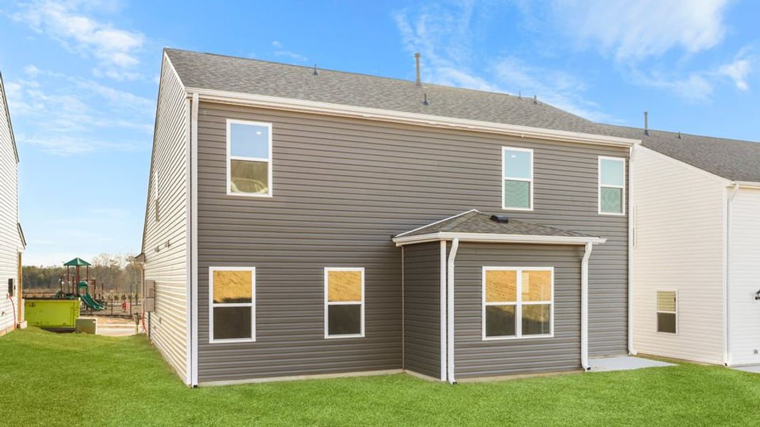 Exterior details and patio area of a home in Hunters Ridge, Woodruff (Image 4).